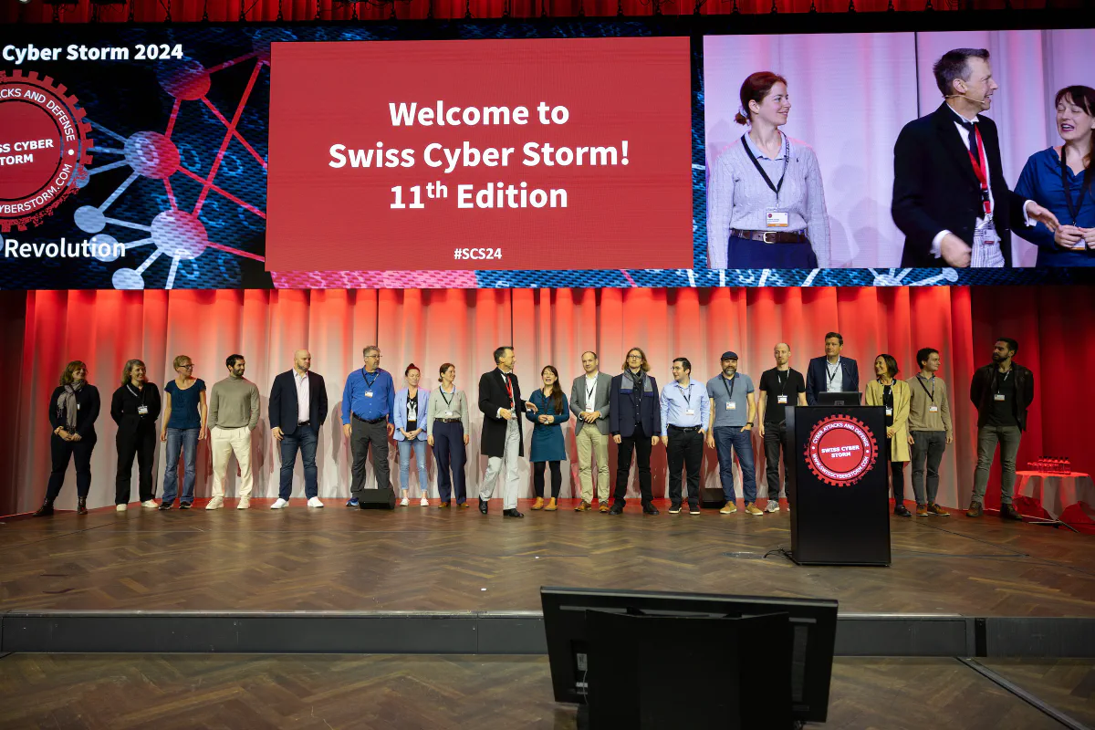 View of the main stage of the Swiss Cyber Storm conference with a lineup of speakers